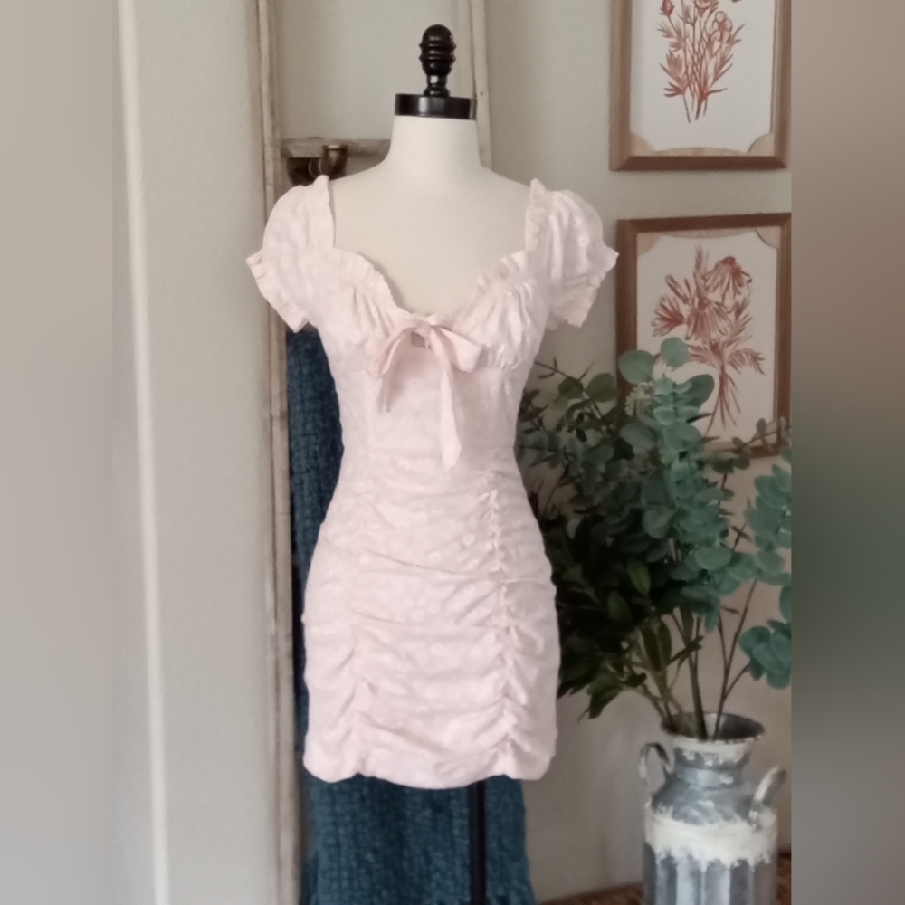 Pink Ruffled Blouse with Romantic Detailing